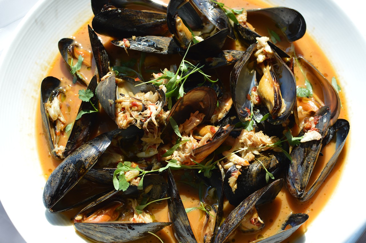 Chef Dante Boccuzzi has brought his experience in Hong Kong to his mussel dish at DBA in Akon and guess what? It is loaded with Sriracha. Cooked in a wok, the mussels are tossed with spicey crab  soy, garlic, ginger,lime juice, cilantro, and engulfed in Sriracha. Dante Boccuzzi is located at 21 Furnace St, Akron. Call 330-375-5050 or visit restaurantdante.us for more information.