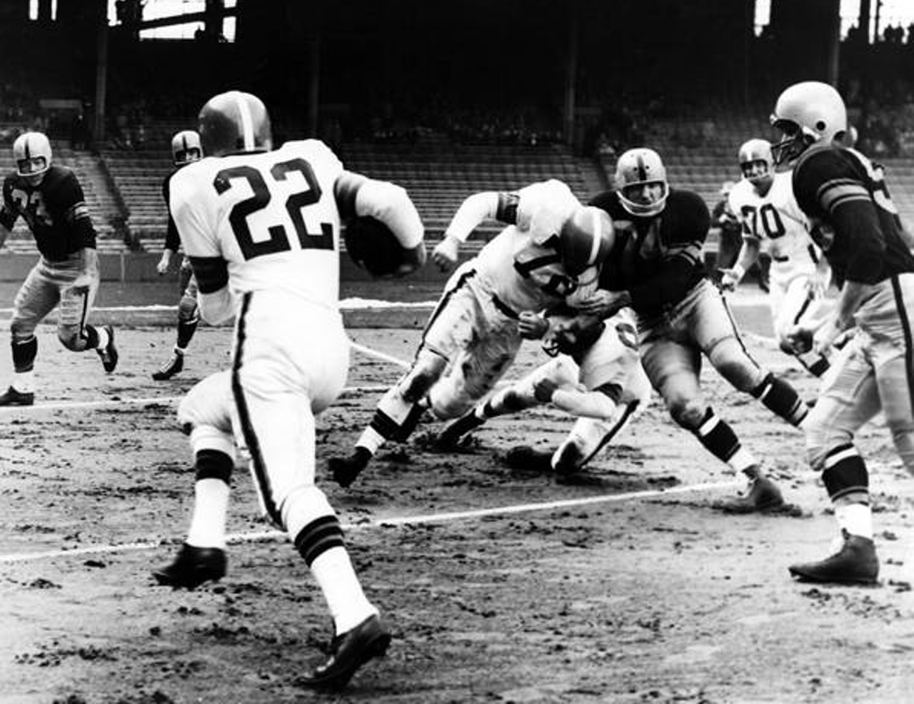 Cleveland Browns vs. Pittsburgh Steelers- 1955
Final Score- Cleveland 41: Steelers 14
"Cleveland Browns defensive back Ken Konz (#22) scores a touchdown from the 15-yard line after intercepting a pass from Pittsburgh Steelers quarterback Jim Finks. Browns #72 John Kissell and #82 Carlton Massey block Steelers Frank Varrichione (#74). Also pictured is Browns #70 Don Colo. The Browns won the game 41-14, to improve to a 7-2 record for the 1955 season."