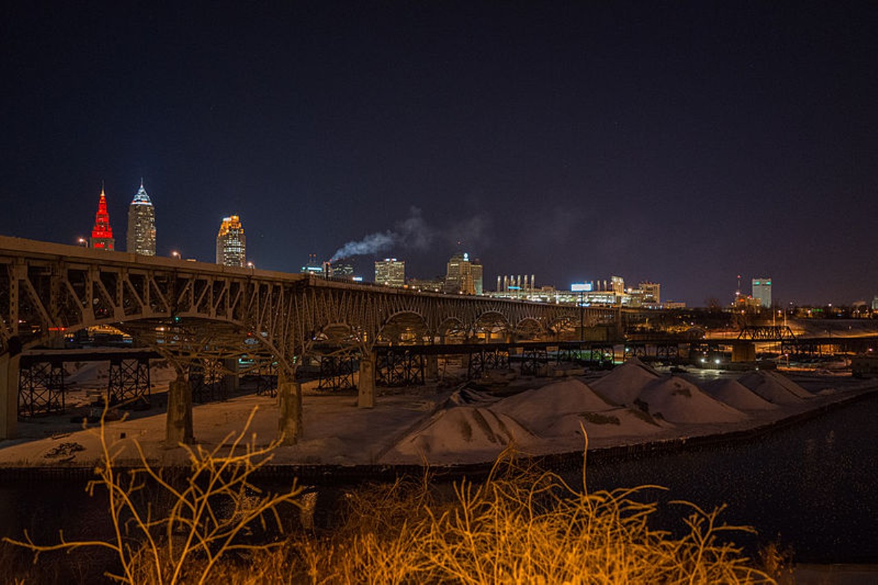 Downtown Cleveland and the old Innerbelt Bridge, as seen from Tremont at night, 2014.