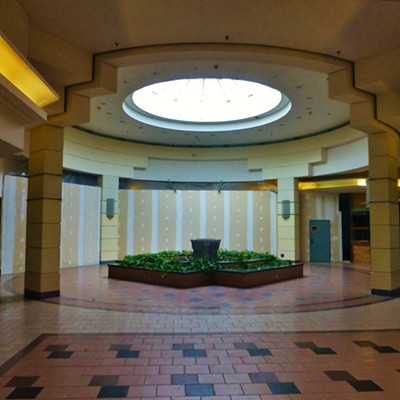 Fountain next to the boarded up food court entrance.