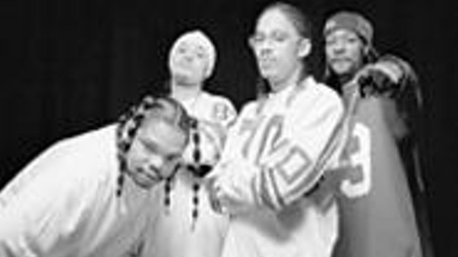 Get Bizzy! The non-incarcerated Bone Thugs (Bizzy, 
    second from left) in happier times.