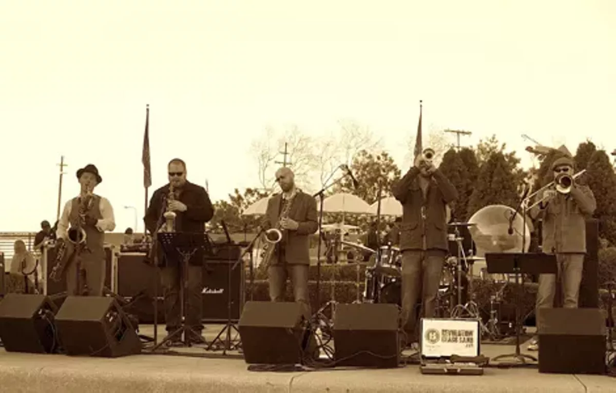 f4d6dd67_spotlight_revolutionbrass.webp