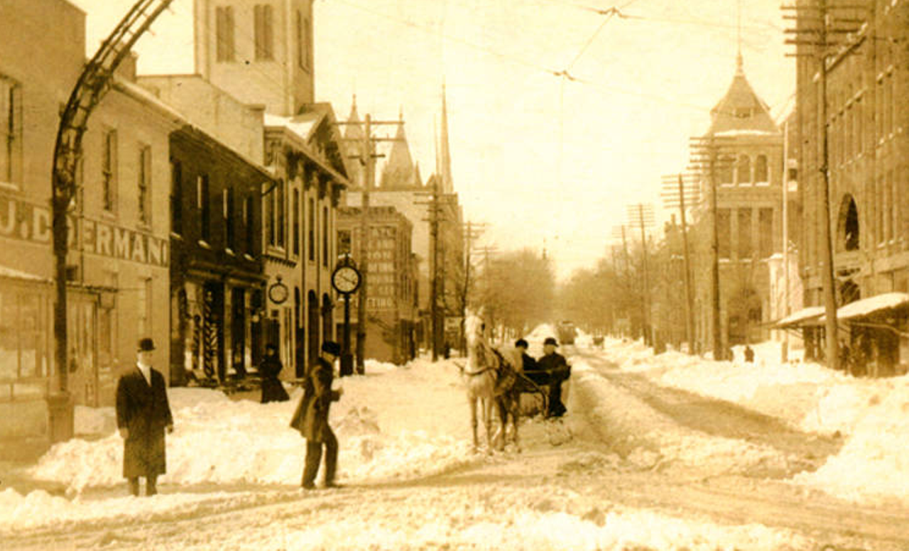 Looking west on Park Avenue West from Main Street following the November 1913 blizzard.