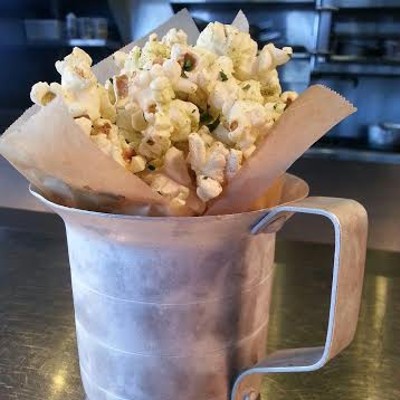 Many versions of popcorn have been popping up lately, but The Willeyville's is the most extreme and delicious. Served on their dinner menu, the spicy phat popcorn is tossed with pork fat, cilantro & jalapeno powder, and lime zest.