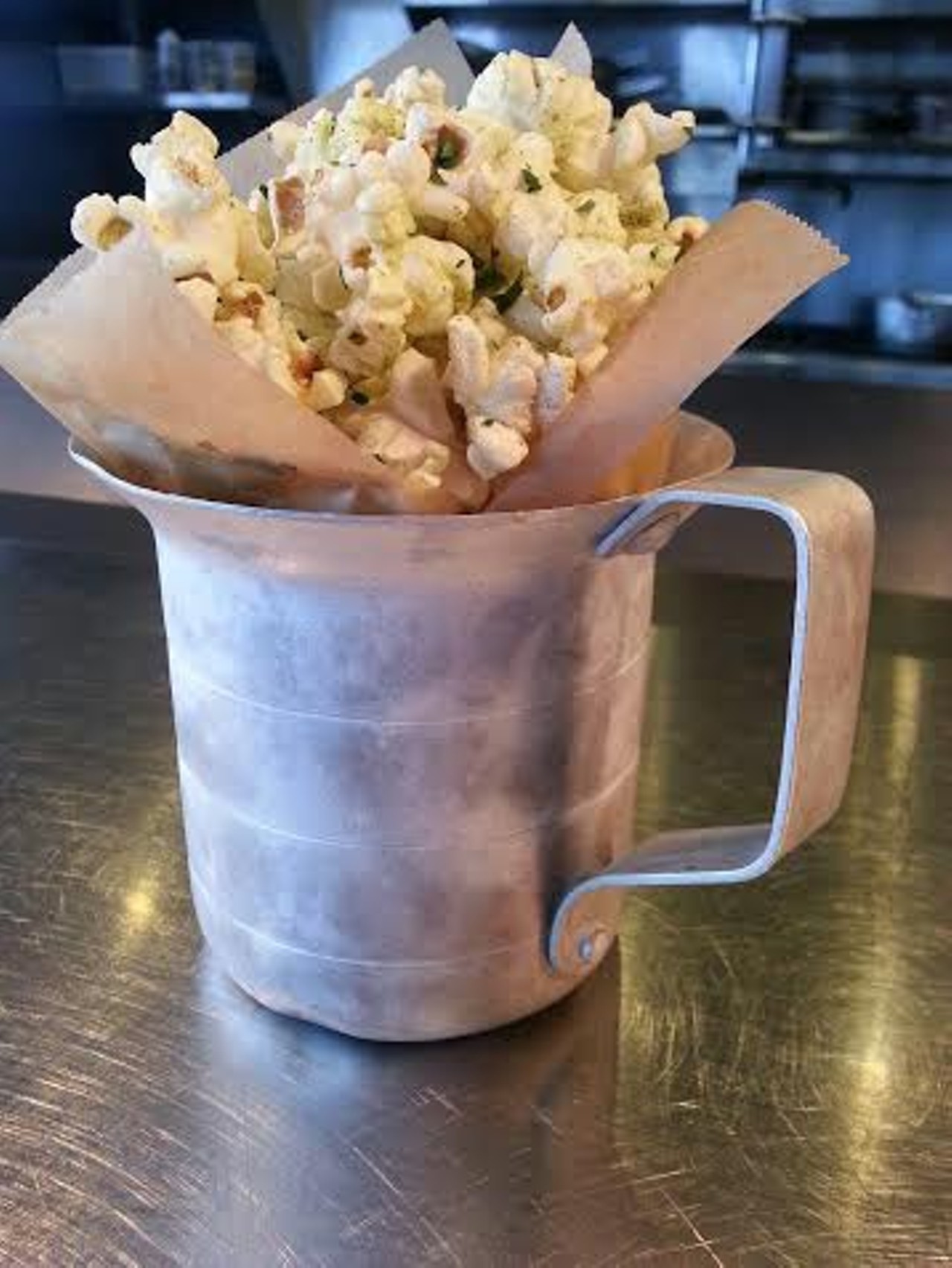 Many versions of popcorn have been popping up lately, but The Willeyville's is the most extreme and delicious. Served on their dinner menu, the spicy phat popcorn is tossed with pork fat, cilantro & jalapeno powder, and lime zest.