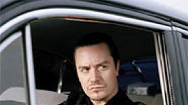 Mike Patton: From painters' caps to pinstripes.