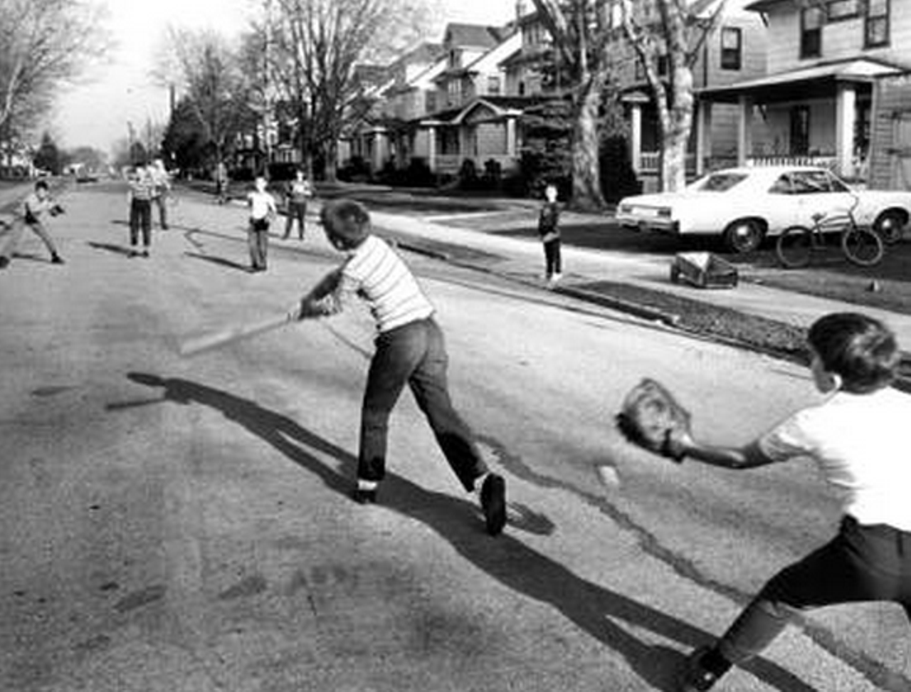 Playing a casual game of street ball, 1968.
