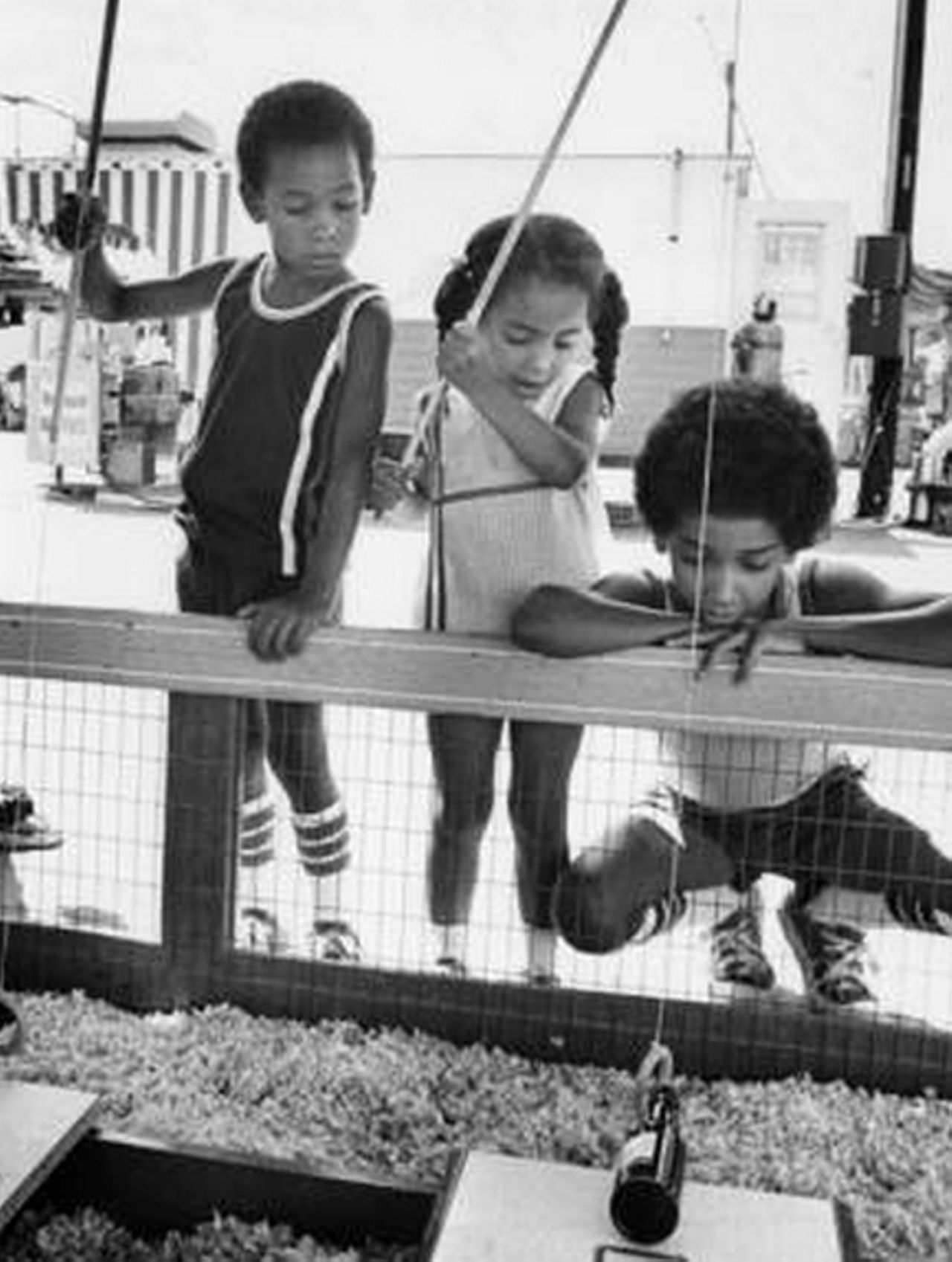Playing a game at the Cuyahoga County fair, 1979.