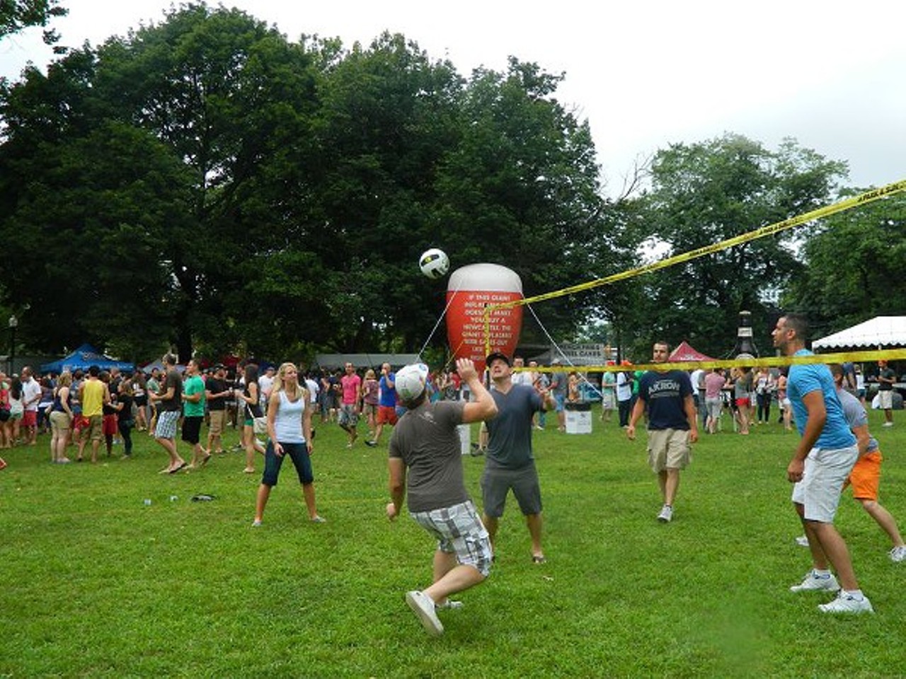 Round up a handful of other semi-drunken Clevelanders for a fun game of volleyball or cornhole.
