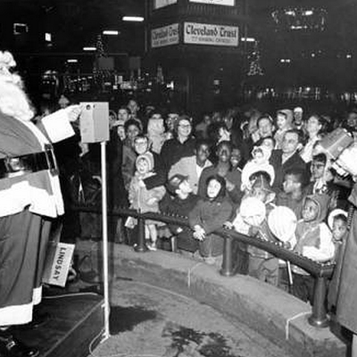 Santa Claus entertains a crowd in Public Square, 1956.