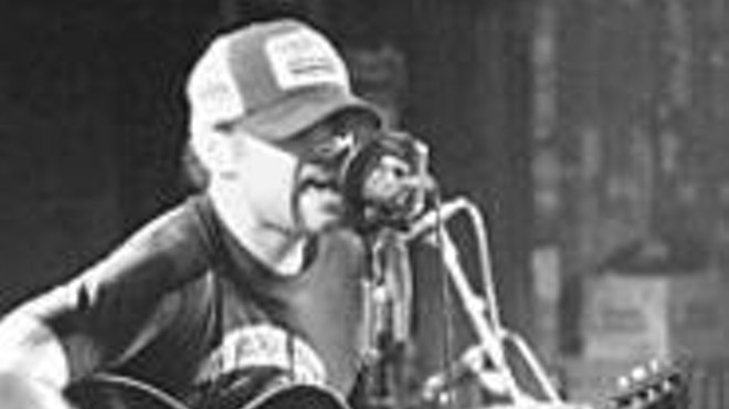 Scott H. Biram brings his trucker hat and his one-man band 
    to the Beachland on Thursday.