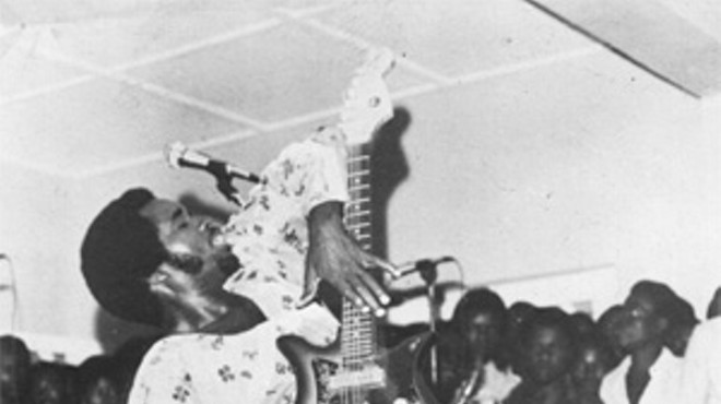 Sir Victor Uwaifo shows Jimi Hendrix how it's done.