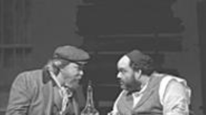 Tevye (Tom Fulton, left) and Lazar Wolf (Noah Budin), 
    basking in their "gotcha" moment.