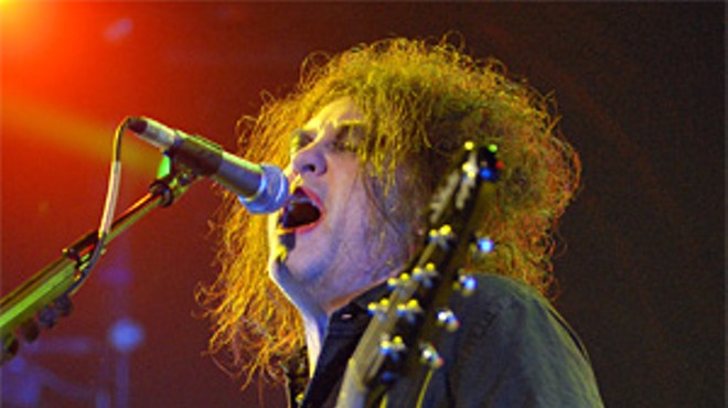 The Cure's Robert Smith puts on his happy face at the Wolstein Center.