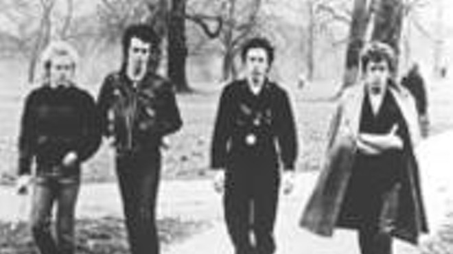 The Sex Pistols unwind with a stroll in the park.