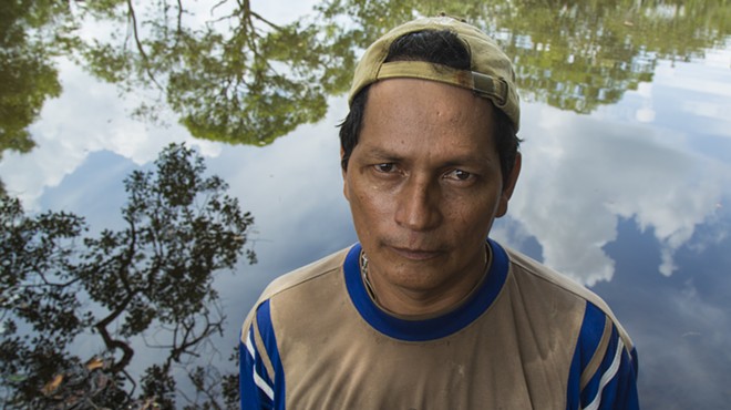 Tom Laffay's photo of Astrubal Linares Vaca, a Colombian farmer whose lagoons were contaminated by a Colombian oil company.