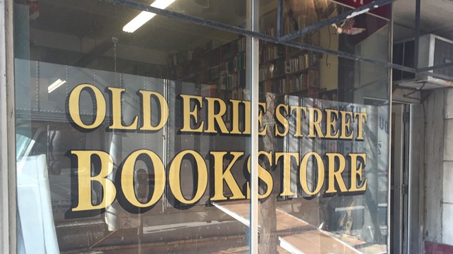 Movers Actively Clearing out Old Erie Street Bookstore Downtown (2)