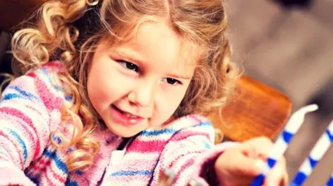 Image: FAMILY FUN Chanukah Candlelighting