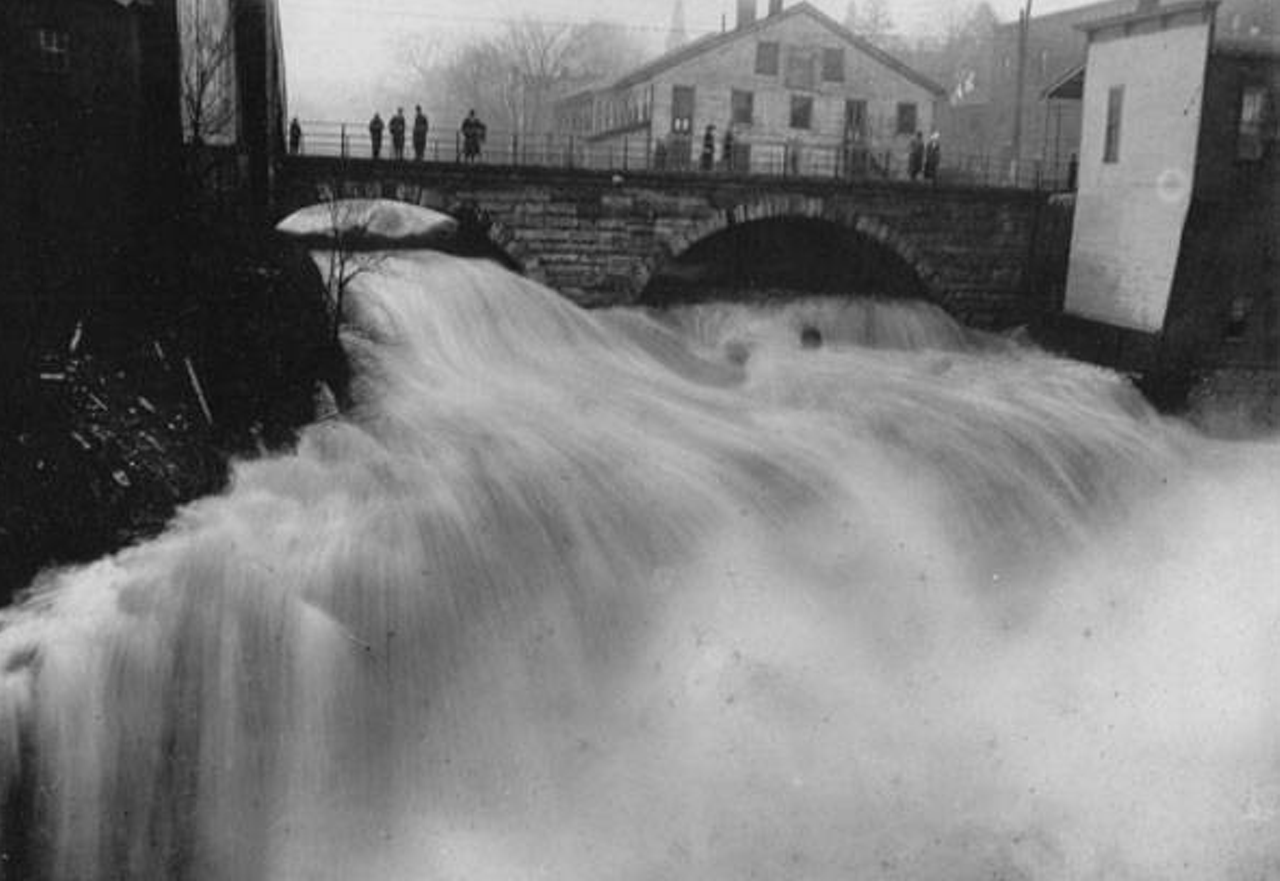 View of the High Falls looking east during the flood of 1913. A series of crazy weather conditions led to the flood, which remains one of the biggest to date in the state of Ohio.