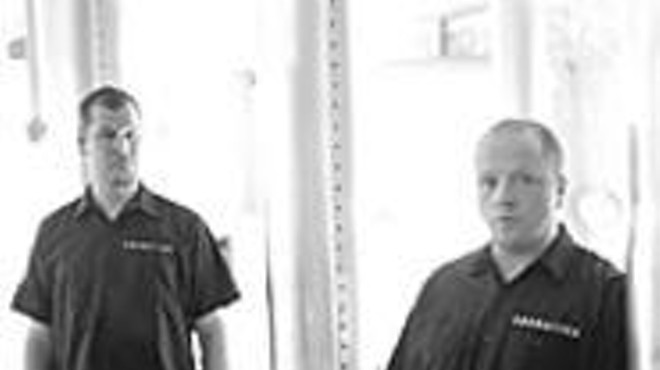 VNV Nation frontman Ronan Harris (right) wants you to 
    "Get off your ass and get yourself out of your problem."