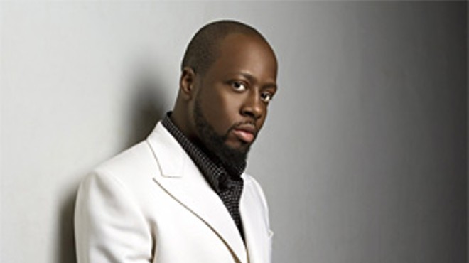 Wyclef contemplates asking Shakira for a painting or two.