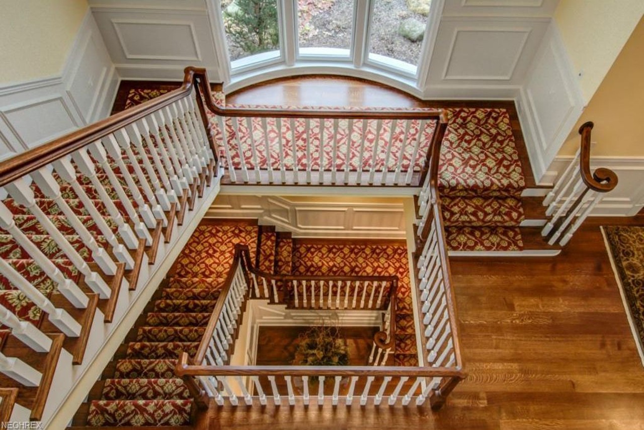  The Pristine One: 14955 County Line Rd., Chagrin Falls
$3,145,000
This five bedroom estate was custom built to fit in perfectly with the topography of the 7-acre lot it sits upon. The craftsmanship, white marble accents, staircase and even the gym, are absolutely stunning.
Photos via Zillow