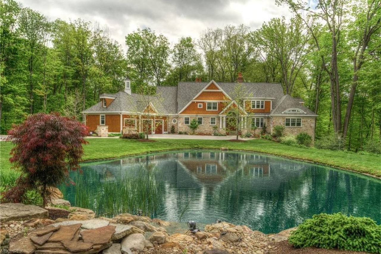  The Pristine One: 14955 County Line Rd., Chagrin Falls
$3,145,000
This five bedroom estate was custom built to fit in perfectly with the topography of the 7-acre lot it sits upon. The craftsmanship, white marble accents, staircase and even the gym, are absolutely stunning.
Photos via Zillow