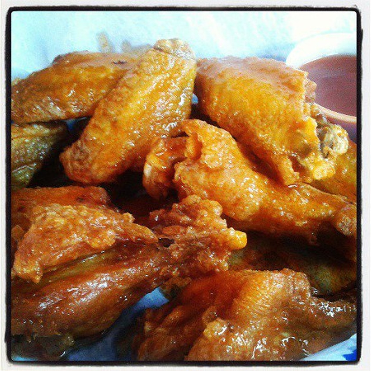 Around the Corner - This Lakewood landmark is known for its great bar promotions, but they have also won awards for their deep fried wings. We recommend the black pepper dry rub. Around the Corner is located at 18616 Detroit Ave. Call (216) 521-4413 for more information.