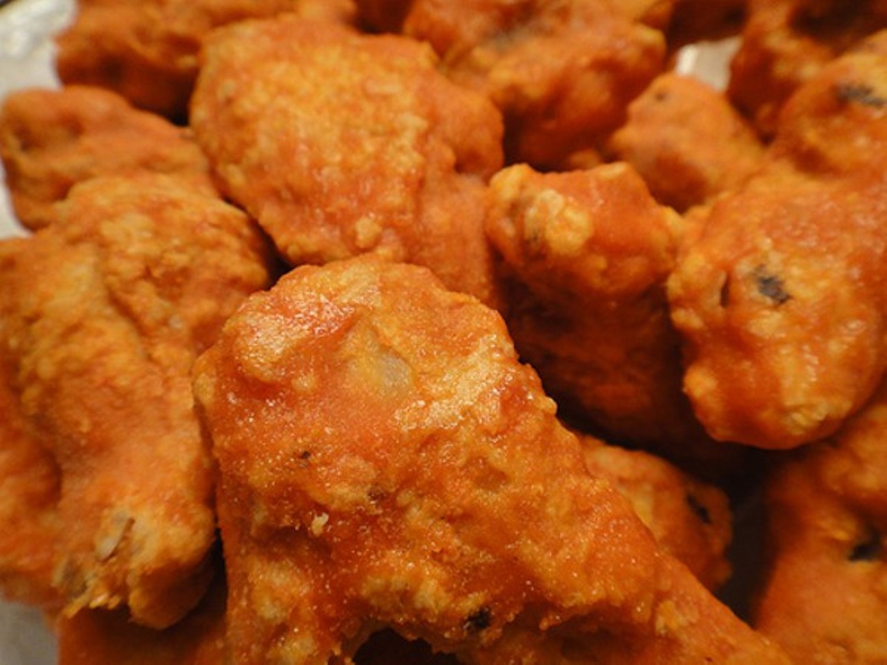 Dina's Pizza & Pub- 
Dina's Pizza & Pub's award winning wings are a staple in Old Brooklyn. They offer over 25 varities of sauces, but you can't go wrong with the hot Carribean- Just enough island spice. Dina's Pizza & Pub is located at 5701 Memphis Ave. Call 216-351-3663 for more information. (Photo via Flickr CC)