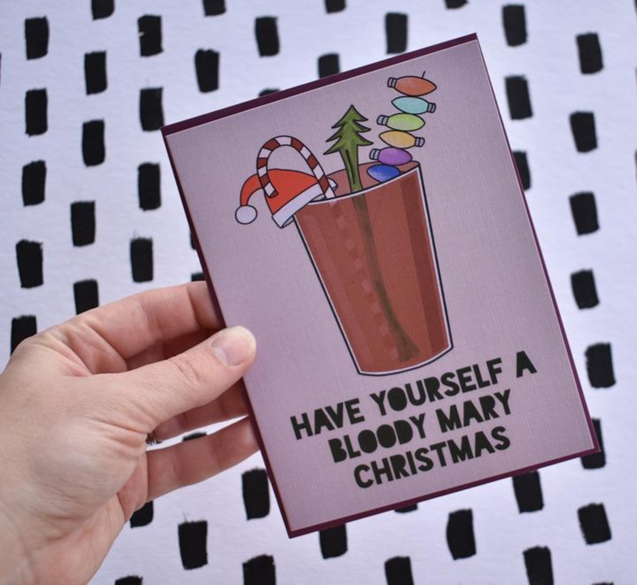 Fiber and Gloss Holiday Cards 
Cost: $4 each
Sometimes all you need is a holiday card to brighten the spirit, and Fiber and Gloss has plenty of sassy and funny cards  that will spread the holiday cheer. Plus, you can feel good that these cards are hand drawn and printed in Ohio.