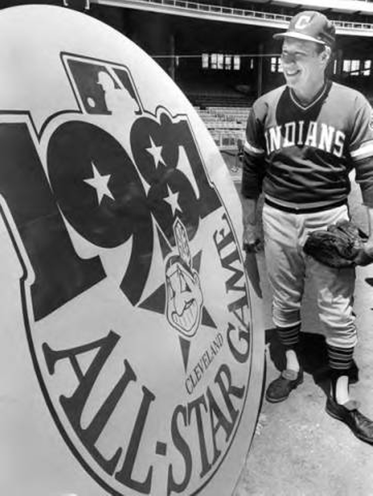 Cleveland Indians pitching legend Bob Feller admires the logo for the 1981 All-Star game.