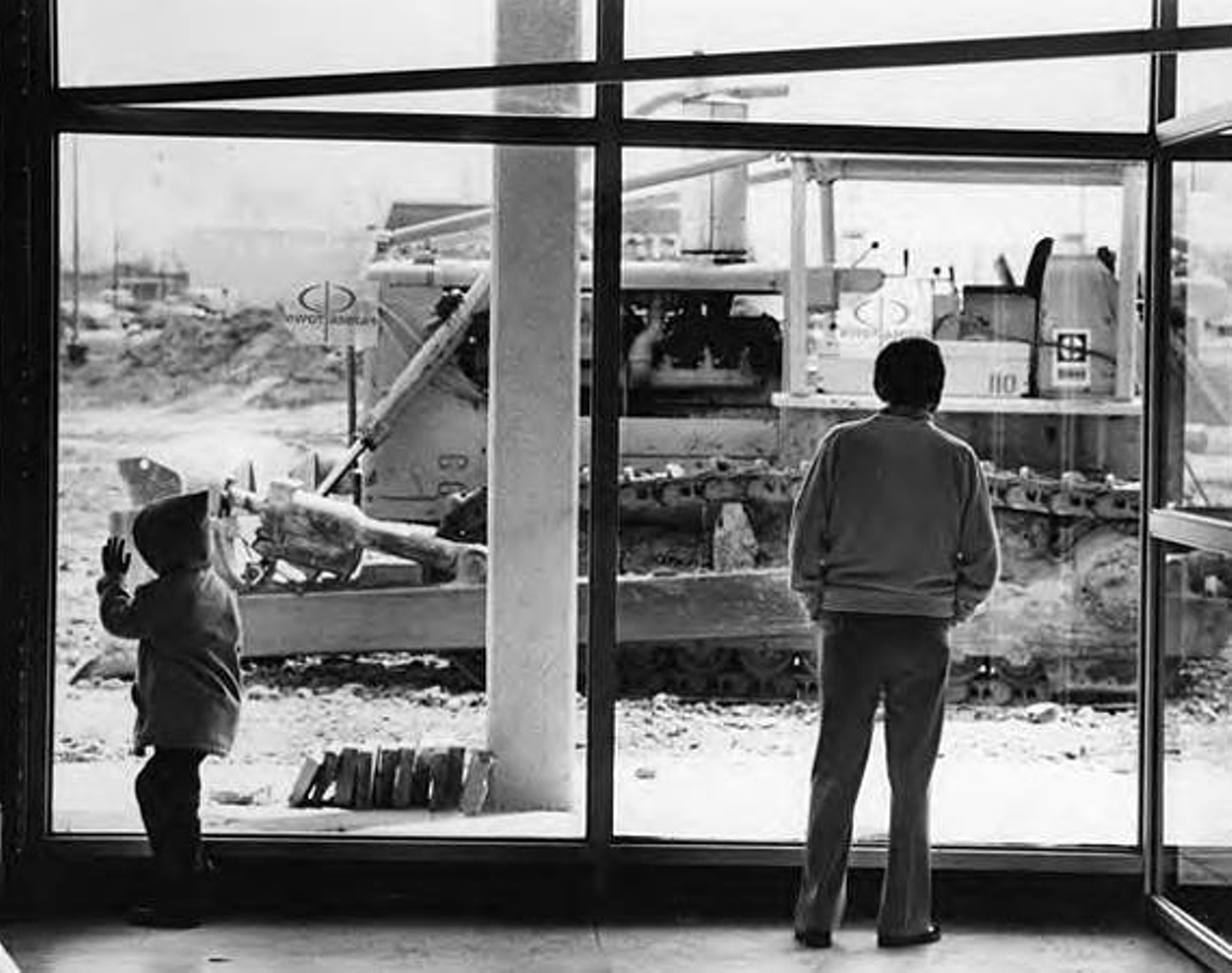 Patrons watch construction outside of Parmatown mall.