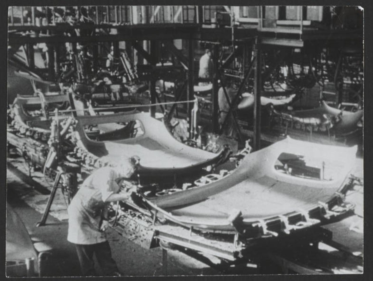 Automotive parts on the assembly line. c. 1935