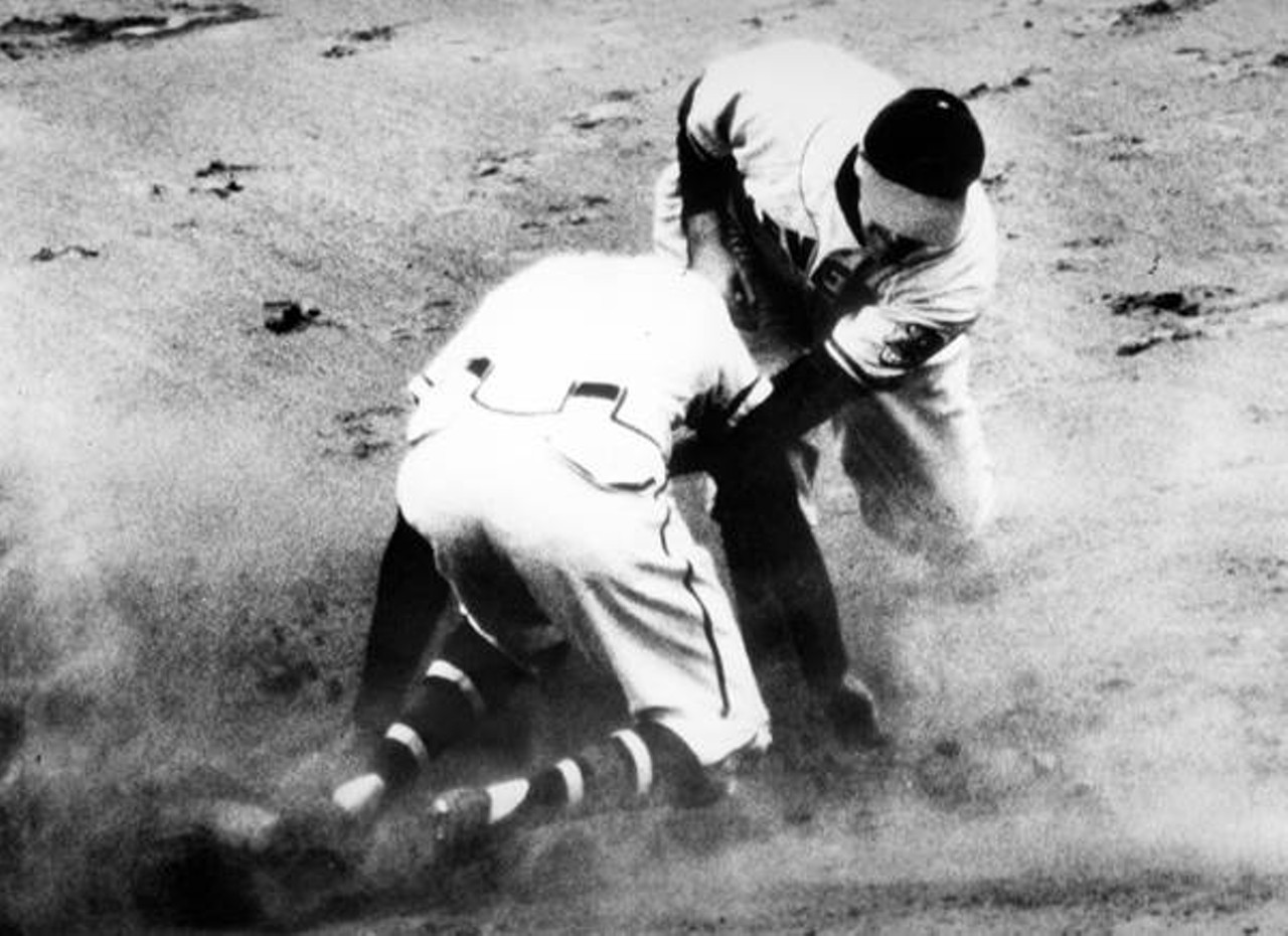 Boston Braves first baseman Earl Torgeson steals second base during game one of the World Series, with Indians' Lou Boudreau covering, 1948