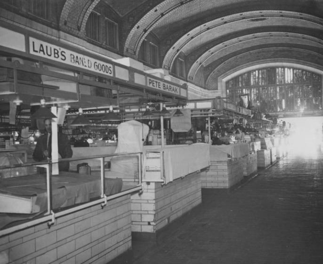 Interior view while market is closed. Signs visible for Laub's baked goods and Pete Barak. c. 1946