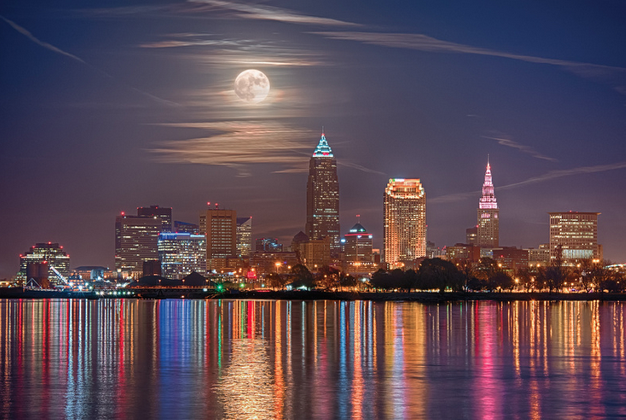 Glenn Petranek print - $25 (11x14)
In late November, a photo of the Cleveland skyline worked its way around Facebook and Imgur. It was a stunning, colorful shot of our iconic buildings and an imposing full moon. The lights reflected hallucinogenically off a calm Lake Erie. Listen, it was the best photo we&#146;d ever seen of our city&#146;s wonderful skyline. Glenn Petranek, the photographer who snapped the shot on Nov. 25, immediately began receiving praise from around town. &#147;I took that [photo] at the full moon rise the Wednesday before last Thanksgiving,&#148; Petranek tells us. &#147;There was an organized shoot that evening with nearly 100 photographers on the upper part of Edgewater Park. I decided not to be a part of that crowd and went to the far west edge of Edgewater, down a set of stairs to Perkins Beach. There the city lights reflected off a glass-like lake, enabling me to get the shot.&#148; glennpics.com