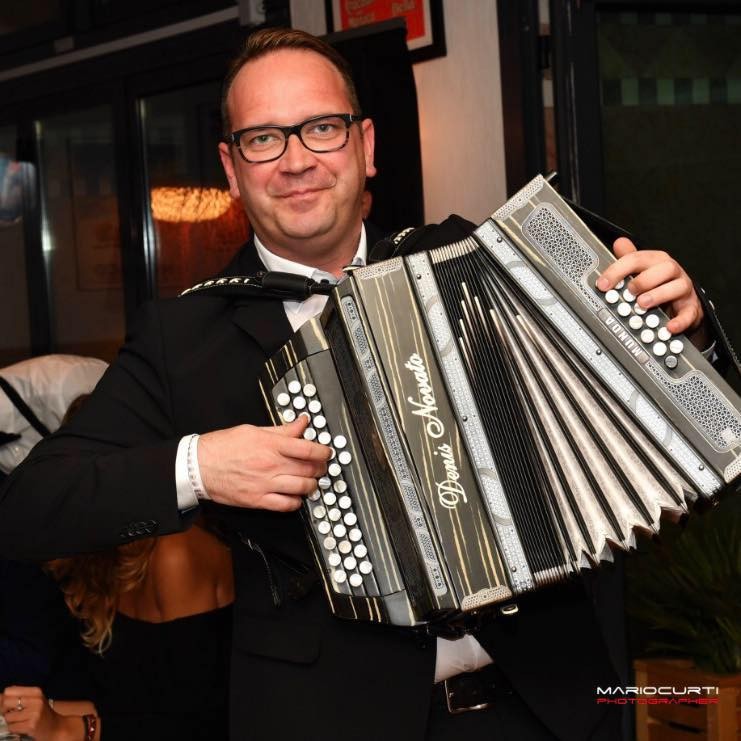 World diatonic accordion champion Denis Novato