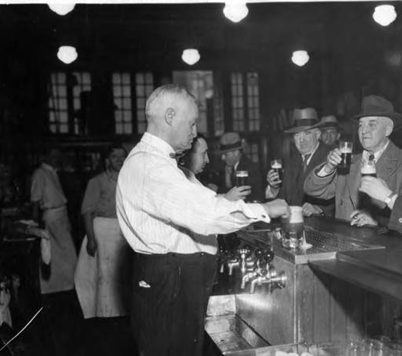 Otto Moser tends bar in downtown Cleveland, 1933.