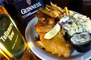 A nip o' whiskey and a pint o' Guinness are fine companions for Flannery's fish 'n' chips. - WALTER NOVAK