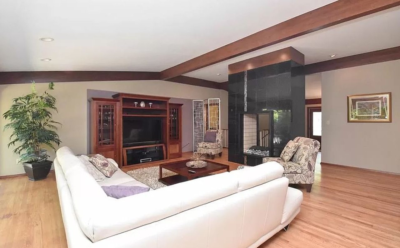 A See-Through Fireplace is the Centerpiece of This Mid-Century Ranch in Fairview Park