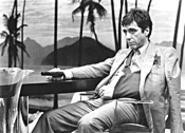 Al Pacino introduces some very bad men to his little friend - in Scarface, one of the many blood-saturated flicks - in Bullets Over Hollywood.