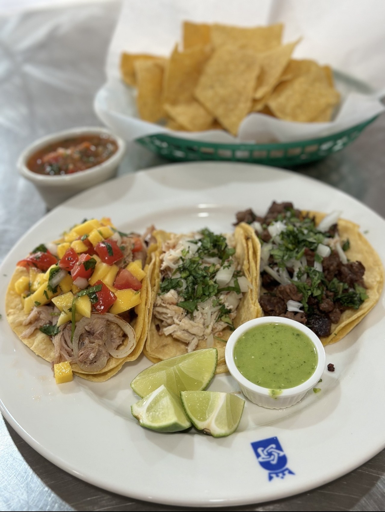El Rinconcito Chapin
3 TACOS SPECIAL
Chicken: Topped with onions and cilantro side of green salsa
Steak: Topped with onion and cilantro side of green salsa
Carnitas: Topped with onion and cilantro side of green salsa 
The 3 taco special is going to include a side of chips and salsa all for $10.