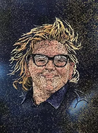 Embroidered portrait of victim of gun violence