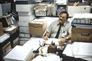 Boxed in: If you look hard, you'll find Office Space's Stephen Root buried there among all the TPS reports.