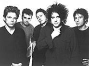 Boys do cry: Robert Smith (second from right) has - rediscovered his youthful vigor.