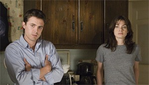 Casey Affleck and Michelle Monaghan react to Kenny Lofton's two-run homer.