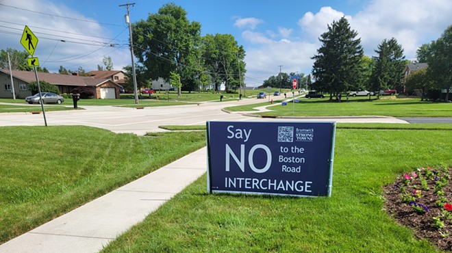 Many yards in and around Boston Road feature signs opposing the interchange.