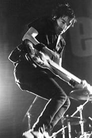 Everclear bassist Craig Montoya jumped for joy at the - band's April 13 show at the Agora. - WALTER  NOVAK