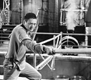 Fat chance: Hong Kong's Cary Grant/John Wayne - finally gets to show his stuff -- kind of.