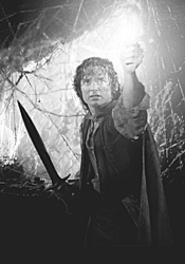 Frodo (Elijah Wood) lights the way in the final - installment of the Lord of the Rings epic.
